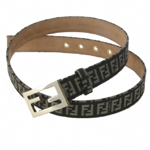 Fendi 8C0130/7C0130 Zucchino Leather Belt- Mogano - The Fendi 7C0130/8C0130 Zucchino Leather Bellt is a stylish belt with beige Signature Zucchino (Small double "Fs") monogram presented on dark-brown jacquard fabric. It featuresgold-toned buckle, interior suede leather and is available in different sizes. It also includes a Fendi dust bag as well as an original Fendi bag ans is Made in Italy. 