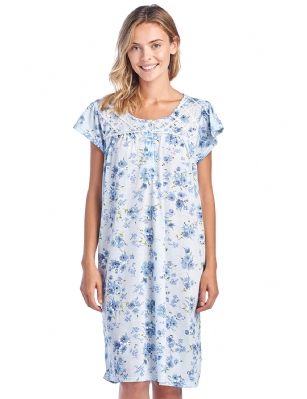 Casual Nights Women's Flowery Short Sleeve Nightgown - Blue - Hit the sack in total comfort with this Soft and lightweight cotton blend Nightgown From Casual Nights in a fun Floral pattern in a fun floral pattern. Nightshirt features: 5 Button closure, round neck, short sleeves, detailed with lace and ribbon for an extra feminine touch. Approximately 40" from shoulder to hem. A comfortable fit perfect for sleeping or lounging around.