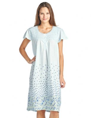 Casual Nights Women's Smocked Floral Short Sleeve Nightgown - Blue - Please use our size chart to determine which size will fit you best, if your measurements fall between two sizes we recommend ordering a larger size as most people prefer their sleepwear a little looser.Medium: Measures US Size 68, Chests/Bust 35-36"Large: Measures US Size 10-12, Chests/Bust 37-39"X-Large: Measures US Size 14-16, Chests/Bust 39.5-41"XX-Large: Measures US Size 16-18, Chests/Bust 42-44"3X-Large: Measures US Size 18W-20W, Chests/Bust 46-48"4X-Large: Measures US Size 22W-24W, Chests/Bust 50-52"This Smocked Knit Short Sleeve Nightgown from Casual Nights sleepwear is Soft and lightweight in a feminine border floral pattern with beautiful fancy smocked and lace detail, Sleep dress Features 5 Button closure, short cap sleeves. Gown measures 40" from shoulder to hem. A comfortable fit perfect for gifts, sleeping or as a gown to lounge around as a house-dress. Beautiful enough for special occasions, yet comfortable enough for every day. 
