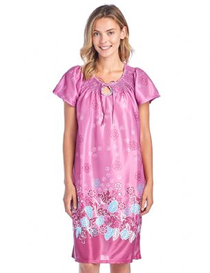 Casual Nights Women's Round Neck Mu-Mu Housecoat Lounger - Mauve - You'll love slipping into this Slip over Muumuu Caftan Dress From our Lounge Dresses & MuuMuus collection, designed in Floral silky satin fabric with a relaxed Fit. This Duster Features Short Sleeves, Smocked Detail, and Tie neck closure. This Ultra-Lightweight fabric House Dress will keep you comfortable and stylish to wear it around the house or to sleep in. 