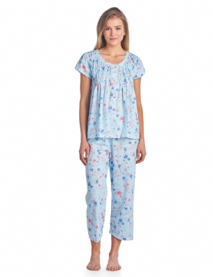 Casual Nights Women's Short Sleeve Capri Pajama Set - Blue - Please use this size chart to determine which size will fit you best, if your measurements fall between two sizes we recommend ordering a larger size as most people prefer their sleepwear a little looser. Medium: Measures US Size 2-4, Chests/Bust 34"-35" Large: Measures US Size 68, Chests/Bust 35-36" X-Large: Measures US Size 10-12, Chests/Bust 37-38" XX-Large: Measures US Size 12-14, Chests/Bust 38.5-40" Hit the sack in total comfort with these Soft and lightweight Cotton Blend Pajamas in a fun pattern Capri Length Pants with an elastic drawstring waist for easy pull on, pant inseam length approximately 21", Shirt Features: Cap Sleeves, round neck, 5 Button closure, ribbon details for the extra feminine touch. A comfortable straight fit perfect for sleeping or lounging around.