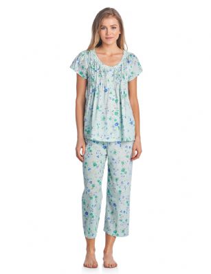 Casual Nights Women's Short Sleeve Capri Pajama Set - Green - Please use this size chart to determine which size will fit you best, if your measurements fall between two sizes we recommend ordering a larger size as most people prefer their sleepwear a little looser. Medium: Measures US Size 2-4, Chests/Bust 34"-35" Large: Measures US Size 68, Chests/Bust 35-36" X-Large: Measures US Size 10-12, Chests/Bust 37-38" XX-Large: Measures US Size 12-14, Chests/Bust 38.5-40" Hit the sack in total comfort with these Soft and lightweight Cotton Blend Pajamas in a fun pattern Capri Length Pants with an elastic drawstring waist for easy pull on, pant inseam length approximately 21", Shirt Features: Cap Sleeves, round neck, 5 Button closure, ribbon details for the extra feminine touch. A comfortable straight fit perfect for sleeping or lounging around.