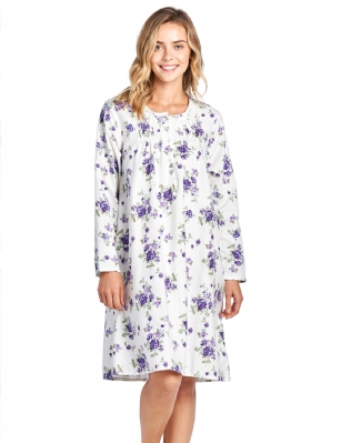 Casual Nights Women's Flannel Floral Long Sleeve Nightgown - Floral Purple - Please use our size chart to determine which size will fit you best, if your measurements fall between two sizes we recommend ordering a larger size as most people prefer their sleepwear a little looser. Medium: Measures US Size 68, Chests/Bust 35-36" Large: Measures US Size 8-10, Chests/Bust 37-38" X-Large: Measures US Size 12-14, Chests/Bust 39-40" XX-Large: Measures US Size 16, Chests/Bust 41-42" 3X-Large: Measures US Size 18, Chests/Bust 42-44" Hit the sack in total comfort with this Soft and lightweight Cotton Flannel Nightgown, Features Round neck, Approximately 38" from shoulder to hem, long sleeves, 6 button closure, detailed with lace and Stitching for an extra feminine touch. A comfortable fit perfect for sleeping or lounging around. 