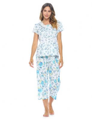 Casual Nights Women's Short Sleeve Embroidered Floral Capri Pajama Set - Blue - Hit the sack in total comfort with these Soft and lightweight Knit Pajamas in a fun Floral pattern Capri Length Pants with an elastic drawstring waist for comfort, Shirt Features Short Sleeves, 4 Button closure, Embroidery, lace Trimand flattering pintuck details. A comfortable straight fit perfect for sleeping or lounging around.