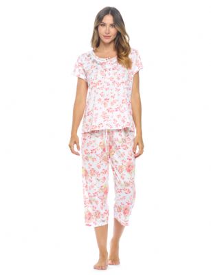 Casual Nights Women's Short Sleeve Embroidered Floral Capri Pajama Set - Pink - Hit the sack in total comfort with these Soft and lightweight Knit Pajamas in a fun Floral pattern Capri Length Pants with an elastic drawstring waist for comfort, Shirt Features Short Sleeves, 4 Button closure, Embroidery, lace Trimand flattering pintuck details. A comfortable straight fit perfect for sleeping or lounging around.