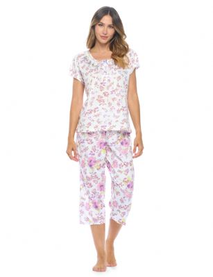 Casual Nights Women's Short Sleeve Embroidered Floral Capri Pajama Set - Purple - Hit the sack in total comfort with these Soft and lightweight Knit Pajamas in a fun Floral pattern Capri Length Pants with an elastic drawstring waist for comfort, Shirt Features Short Sleeves, 4 Button closure, Embroidery, lace Trimand flattering pintuck details. A comfortable straight fit perfect for sleeping or lounging around.