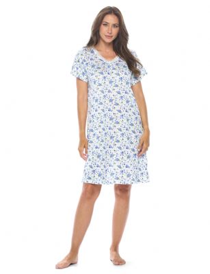 Casual Nights Women's Super Soft Yummy Nightshirt, Short Sleeve Nightgown, Night Dress with Fun Prints & Patterns - Blue Flowers - This softest lightweight short sleeve Nightgown for ladies from the Casual Nights Loungewear and Sleepwear robes Collection, in beautiful feminine Bright Solid & floral print pattern design. This easy to wear Pullover Nightdress is made of the softest 95% polyester and 5% elastane material, this sleep dress Features: scoop neckline, short sleeves, with detailed lace trimming by yolk for an extra fancy touch. Mid-calf length approx. 38-39 Shoulder to hem. This lounge wear muumuu dress has a relaxed comfortable fit and comes in regular and plus sizes M, L, XL, 2X, all year winter and summer versatile multi uses, wear around to bed as Pj's or lounging the house as relaxed home day waltz dress, a sleepshirt dress, Our sleep robe gowns is perfect to use for maternity, labor/delivery, hospital gown. Makes a perfect Mothers Day gift for your loved ones, mom, older women, or elderly grandmother. Even beautiful and comfortable enough for everyday use around the house. Please use our size chart to determine which size will fit you best, if your measurements fall between two sizes, we recommend ordering a larger size as most people prefer their sleepwear a little looser. Medium: Measures US Size 6-8 -, Chests/Bust 35"-36" Large: Measures US Size 10-12, Chests/Bust 37-38" X-Large: Measures US Size 14-16, Chests/Bust 38.5-40" XX-Large: Measures US Size 18-20, Chests/Bust 41.5-43"