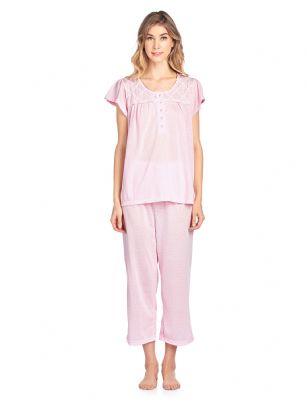 Casual Nights Women's Short Sleeve Lace Dot Capri Pajama Set - Pink - Size recommendation: Size Medium (4-6) Large (8-10) X-Large (12-14) XX-Large (16-18), Order one size up For a more Relaxed FitHit the sack in total comfort with these Soft and lightweight Cotton Blend Pajamas in a fun Dot pattern Capri Length Pants with an elastic drawstring waist for easy pull on, pant inseam length approximately 21", Shirt Features:Cap Sleeves, round neck, 5 Button closure, bow accent and lace details for the extra feminine touch. A comfortable straight fit perfect for sleeping or lounging around.