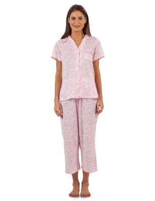 Casual Nights Lace Trim Women's Short Sleeve Capri Pajama Set - Spring Pink - Size recommendation: Size Medium (4-6) Large (8-10) X-Large (12-14) XX-Large (16-18), Order one size up For a more Relaxed FitHit the sack in total comfort with these Soft and lightweight Cotton Blend Pajamas in a fun spring patterns Capri Length Pants with an elastic drawstring waist for easy pull on, pant inseam length approximately 21", Shirt Features: Short Sleeves, Notch collar, handy patch pocket, Button down closure, lace and ribbon details for the extra feminine touch. A comfortable relaxed fit perfect for sleeping or lounging around.