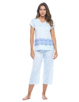 Casual Nights Women's Short Sleeve Floral Capri Pajama Set - Blue - Please use this size chart to determine which size will fit you best, if your measurements fall between two sizes we recommend ordering a larger size as most people prefer their sleepwear a little looser. Top Length 25", Capri Pants Inseam 21"Medium: Measures US Size 2-4, Chests/Bust 32"-34" Large: Measures US Size 4-6, Chests/Bust 34-35" X-Large: Measures US Size 8-10, Chests/Bust 35-36" XX-Large: Measures US Size 10-12, Chests/Bust 37"-38.5" Soft and lightweight Cotton Poly Knit Capri Pajama 2 piece Sleep Set in a fun floral pattern. Short sleeve shirt features: Scoop neck, 4 button placket closure, lace and smocked trim detail, Pajama pants with elasticized waist and drawstring for easy pull on and added comfort, approx. 21" inseam length. PJ's Set offers A comfortable fit perfect for sleeping or lounging around.