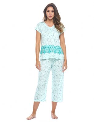 Casual Nights Women's Short Sleeve Floral Capri Pajama Set - Green - Please use this size chart to determine which size will fit you best, if your measurements fall between two sizes we recommend ordering a larger size as most people prefer their sleepwear a little looser. Top Length 25", Capri Pants Inseam 21"Medium: Measures US Size 2-4, Chests/Bust 32"-34" Large: Measures US Size 4-6, Chests/Bust 34-35" X-Large: Measures US Size 8-10, Chests/Bust 35-36" XX-Large: Measures US Size 10-12, Chests/Bust 37"-38.5" Soft and lightweight Cotton Poly Knit Capri Pajama 2 piece Sleep Set in a fun floral pattern. Short sleeve shirt features: Scoop neck, 4 button placket closure, lace and smocked trim detail, Pajama pants with elasticized waist and drawstring for easy pull on and added comfort, approx. 21" inseam length. PJ's Set offers A comfortable fit perfect for sleeping or lounging around.