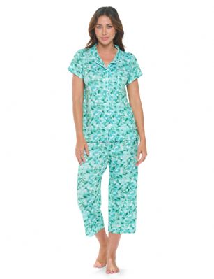 Casual Nights Women's Super Soft Capri Pajamas Set, Short Sleeve Button Down Shirt with Pants PJ Set with Pockets - Floral Green - Soft and lightweight Rayon Knit Pajamas in a fun prints and patterns, coziest pajamas you'll ever own. Features Button down closure with notch collar, matching easy pull on pajama pants with elastic waistband for added comfort, These pj's offer comfortable straight fit perfect for sleeping or curling up on the couch to watch a movie.Please use our size chart to determine which size will fit you best, if your measurements fall between two sizes we recommend ordering a larger size as most people prefer their sleepwear a little looser.Medium: Measures US Size 2-4, Chests/Bust 32"-34" Large: Measures US Size 4-6, Chests/Bust 34-35" X-Large: Measures US Size 8-10, Chests/Bust 35-36" XX-Large: Measures US Size 10-12, Chests/Bust 37"-38.5" 