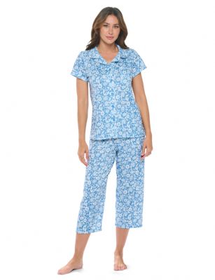 Casual Nights Women's Super Soft Capri Pajamas Set, Short Sleeve Button Down Shirt with Pants PJ Set with Pockets - Ditsy Floral Blue - Soft and lightweight Rayon Knit Pajamas in a fun prints and patterns, coziest pajamas you'll ever own. Features Button down closure with notch collar, matching easy pull on pajama pants with elastic waistband for added comfort, These pj's offer comfortable straight fit perfect for sleeping or curling up on the couch to watch a movie.Please use our size chart to determine which size will fit you best, if your measurements fall between two sizes we recommend ordering a larger size as most people prefer their sleepwear a little looser.Medium: Measures US Size 2-4, Chests/Bust 32"-34" Large: Measures US Size 4-6, Chests/Bust 34-35" X-Large: Measures US Size 8-10, Chests/Bust 35-36" XX-Large: Measures US Size 10-12, Chests/Bust 37"-38.5" 