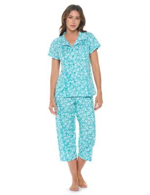 Casual Nights Women's Super Soft Capri Pajamas Set, Short Sleeve Button Down Shirt with Pants PJ Set with Pockets - Ditsy Floral Green - Soft and lightweight Rayon Knit Pajamas in a fun prints and patterns, coziest pajamas you'll ever own. Features Button down closure with notch collar, matching easy pull on pajama pants with elastic waistband for added comfort, These pj's offer comfortable straight fit perfect for sleeping or curling up on the couch to watch a movie.Please use our size chart to determine which size will fit you best, if your measurements fall between two sizes we recommend ordering a larger size as most people prefer their sleepwear a little looser.Medium: Measures US Size 2-4, Chests/Bust 32"-34" Large: Measures US Size 4-6, Chests/Bust 34-35" X-Large: Measures US Size 8-10, Chests/Bust 35-36" XX-Large: Measures US Size 10-12, Chests/Bust 37"-38.5" 