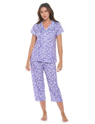 Casual Nights Women's Super Soft Capri Pajamas Set, Short Sleeve Button Down Shirt with Pants PJ Set with Pockets - Ditsy Floral Purple - Soft and lightweight Rayon Knit Pajamas in a fun prints and patterns, coziest pajamas you'll ever own. Features Button down closure with notch collar, matching easy pull on pajama pants with elastic waistband for added comfort, These pj's offer comfortable straight fit perfect for sleeping or curling up on the couch to watch a movie.Please use our size chart to determine which size will fit you best, if your measurements fall between two sizes we recommend ordering a larger size as most people prefer their sleepwear a little looser.Medium: Measures US Size 2-4, Chests/Bust 32"-34" Large: Measures US Size 4-6, Chests/Bust 34-35" X-Large: Measures US Size 8-10, Chests/Bust 35-36" XX-Large: Measures US Size 10-12, Chests/Bust 37"-38.5" 