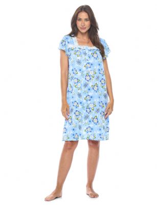 Casual Nights Women's Super Soft Yummy Nightshirt, Short Sleeve Nightgown, Night Dress with Fun Prints & Patterns - Bloom Blue - This softest lightweight short sleeve Nightgown for ladies from the Casual Nights Loungewear and Sleepwear robes Collection, in beautiful feminine Bright Solid & floral print pattern design. This easy to wear Pullover Nightdress is made of the softest 95% polyester and 5% elastane material, this sleep dress Features: A square neckline, short sleeves, 5 Button closure, with detailed lace trimming by yolk and neckline for an extra fancy touch. Mid-calf length approx. 38-39 Shoulder to hem. This lounge wear muumuu dress has a relaxed comfortable fit and comes in regular and plus sizes M, L, XL, 2X, all year winter and summer versatile multi uses, wear around to bed as Pj's or lounging the house as relaxed home day waltz dress, a sleepshirt dress, Our sleep robe gowns is perfect to use for maternity, labor/delivery, hospital gown. Makes a perfect Mothers Day gift for your loved ones, mom, older women, or elderly grandmother. Even beautiful and comfortable enough for everyday use around the house. Please use our size chart to determine which size will fit you best, if your measurements fall between two sizes, we recommend ordering a larger size as most people prefer their sleepwear a little looser. Medium: Measures US Size 6-8 -, Chests/Bust 35"-36" Large: Measures US Size 10-12, Chests/Bust 37-38" X-Large: Measures US Size 14-16, Chests/Bust 38.5-40" XX-Large: Measures US Size 18-20, Chests/Bust 41.5-43"