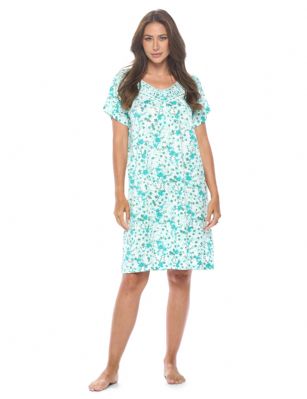 Casual Nights Women's Super Soft Yummy Nightshirt, Short Sleeve Nightgown, Night Dress with Fun Prints & Patterns - Ditsy Floral Green - This softest lightweight short sleeve Nightgown for ladies from the Casual Nights Loungewear and Sleepwear robes Collection, in beautiful feminine Bright Solid & floral print pattern design. This easy to wear Pullover Nightdress is made of the softest 95% polyester and 5% elastane material, this sleep dress Features: Henley-Style with a scoop neckline, short sleeves, 3 Button closure, with detailed lace trimming and pintucked yolk with satin ribbon added for an extra feminine touch. Mid-calf length approx. 38-39 Shoulder to hem. This lounge wear muumuu dress has a relaxed comfortable fit and comes in regular and plus sizes M, L, XL, 2X, all year winter and summer versatile multi uses, wear around to bed as Pj's or lounging the house as relaxed home day waltz dress, a sleepshirt dress, Our sleep robe gowns is perfect to use for maternity, labor/delivery, hospital gown. Makes a perfect Mothers Day gift for your loved ones, mom, older women, or elderly grandmother. Even beautiful and comfortable enough for everyday use around the house. Please use our size chart to determine which size will fit you best, if your measurements fall between two sizes, we recommend ordering a larger size as most people prefer their sleepwear a little looser. Medium: Measures US Size 6-8 -, Chests/Bust 35"-36" Large: Measures US Size 10-12, Chests/Bust 37-38" X-Large: Measures US Size 14-16, Chests/Bust 38.5-40" XX-Large: Measures US Size 18-20, Chests/Bust 41.5-43"
