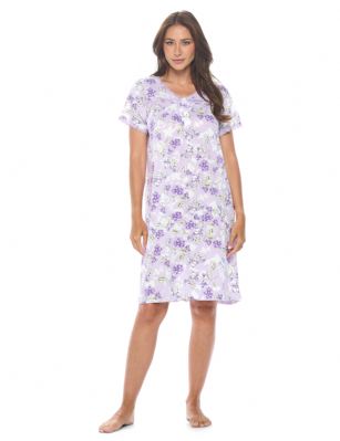 Casual Nights Women's Super Soft Yummy Nightshirt, Short Sleeve Nightgown, Night Dress with Fun Prints & Patterns - Purple Flowered - This softest lightweight short sleeve Nightgown for ladies from the Casual Nights Loungewear and Sleepwear robes Collection, in beautiful feminine Bright Solid & floral print pattern design. This easy to wear Pullover Nightdress is made of the softest 95% polyester and 5% elastane material, this sleep dress Features: Henley-Style with a scoop neckline, short sleeves, 3 button closure, with detailed lace trimming and pintucked yolk added for an extra feminine touch. Mid-calf length approx. 38-39 Shoulder to hem. This lounge wear muumuu dress has a relaxed comfortable fit and comes in regular and plus sizes M, L, XL, 2X, all year winter and summer versatile multi uses, wear around to bed as Pj's or lounging the house as relaxed home day waltz dress, a sleepshirt dress, Our sleep robe gowns is perfect to use for maternity, labor/delivery, hospital gown. Makes a perfect Mothers Day gift for your loved ones, mom, older women, or elderly grandmother. Even beautiful and comfortable enough for everyday use around the house. Please use our size chart to determine which size will fit you best, if your measurements fall between two sizes, we recommend ordering a larger size as most people prefer their sleepwear a little looser. Medium: Measures US Size 6-8 -, Chests/Bust 35"-36" Large: Measures US Size 10-12, Chests/Bust 37-38" X-Large: Measures US Size 14-16, Chests/Bust 38.5-40" XX-Large: Measures US Size 18-20, Chests/Bust 41.5-43"