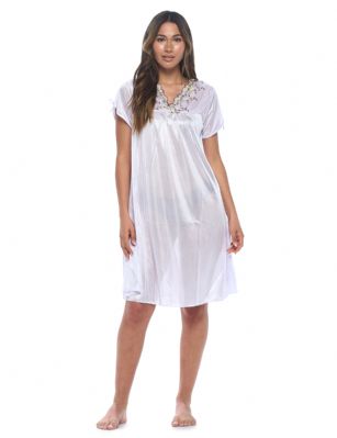 Casual Nights Women's Fancy Lace Neckline Silky Tricot Nightgown - Purple - This lightweight and comfortable silk feel Short Sleeve Women's Lace Trim Lounger Tricot Nightshirt for ladies from the Casual Nights Loungewear and Sleepwear robes Collection, in beautiful feminine floral pattern design. This easy to wear nightshirt is made of 100% Poly fabric. The satin sleep dress Features V-neck neckline with floral embroidery yolk, with bow accent on short sleeves, flirty knee length approx. 38 inches Shoulder to hem. This nightgown has a relaxed comfortable fit and comes in regular and plus sizes M, L, XL, 2X. All year winter and summer versatile multi uses, wear around the house as relaxed home day, a sleepshirt dress. Our sleep robe gowns are perfect to use for maternity, labor/delivery, hospital gown. Youll love slipping it on, this sleep nightgown is a great option for those who want something a lighter and sexier. Makes a perfect Mothers Day gift for your loved ones, mom, older women, or elderly grandmother. Even beautiful and comfortable enough for everyday use around the house.Please use our size chart to determine which size will fit you best, if your measurements fall between two sizes, we recommend ordering a larger size as most people prefer their sleepwear a little looser.  Medium: Measures US Size 8-10, Chests/Bust 36"-38" Large: Measures US Size 1214, Chests/Bust 38.5"-41" X-Large: Measures US Size 16-18, Chests/Bust 42"-44" XX-Large: Measures US Size 18W-20W, Chests/Bust 46-48"